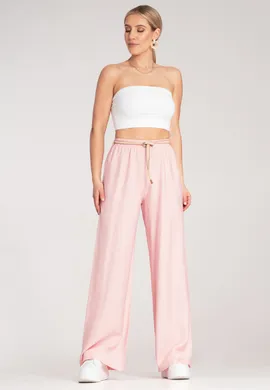 Przewiewne spodnie damskie - Spodnie damskie na lato - Różowe spodnie M1149 r. L/XL